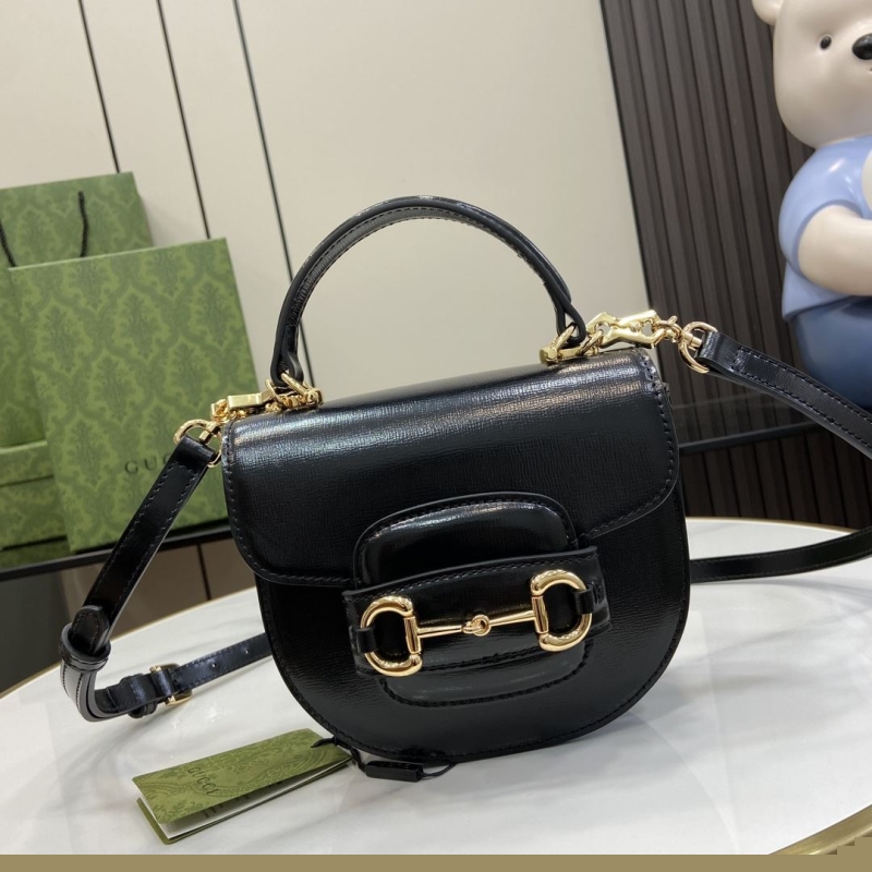 G*u*i top handle bags